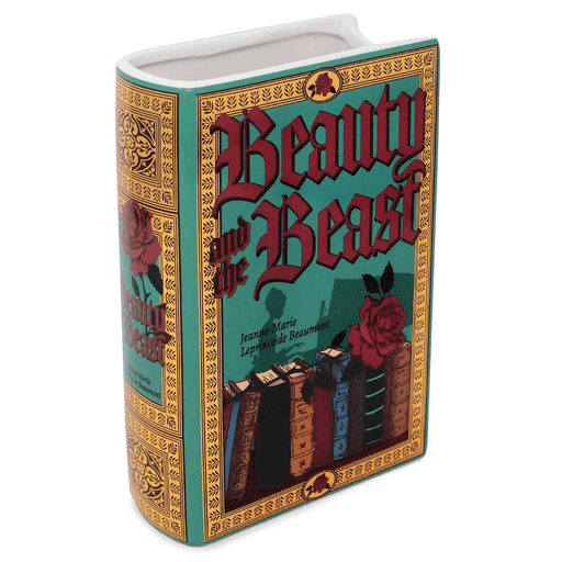 Angled view of large ceramic Beauty and the Beast book vase showing the book-shaped design, open top and decorative spine.