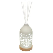 White LED ceramic reed diffuser on a wooden base with white reeds and a Best Mum cut-out design with hearts.