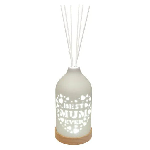 White LED ceramic reed diffuser on a wooden base with white reeds and a Best Mum cut-out design with hearts.