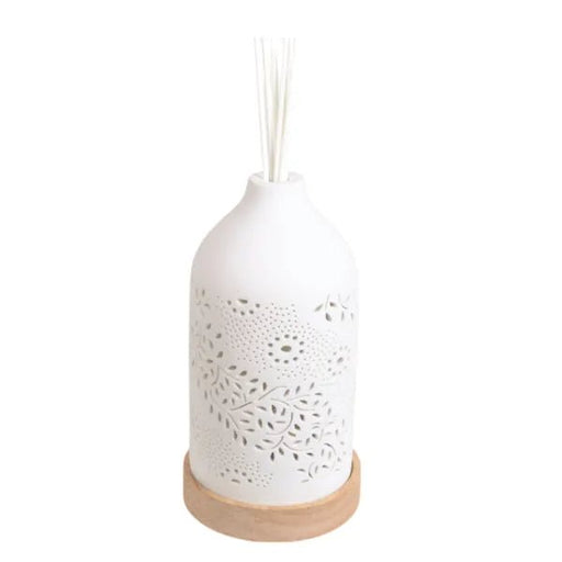 Unlit ceramic reed diffuser with leaf pattern and wood-effect base