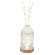 LED ceramic reed diffuser with glowing heart-shaped tree cut-out and reeds

