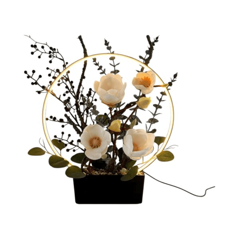 Front view of a 30 x 35cm LED floral lamp with warm halo ring and black base, mains operated.