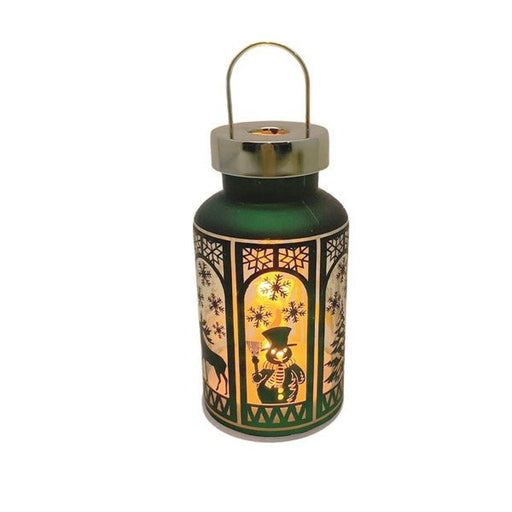 Green 20cm LED lantern with snowy silhouette and flame-effect light

