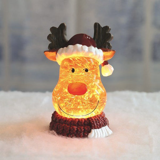 LED reindeer glitter spinner glowing on a snowy display

