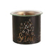 Unlit black and gold Let It Snow tealight wax melter with glass dish on top