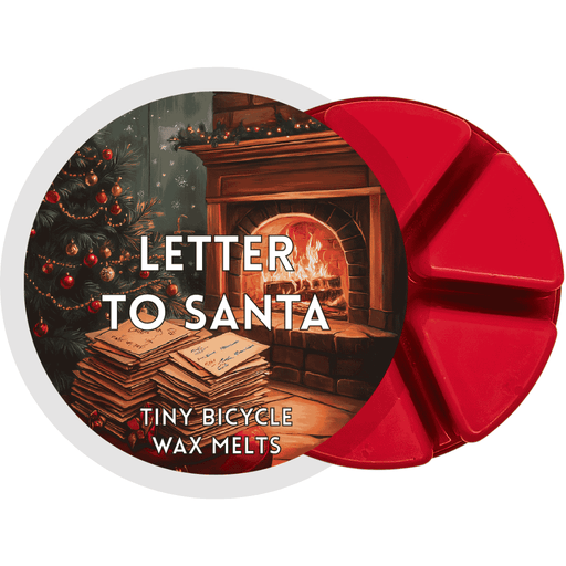 Red Letter to Santa wax melt with festive fireplace scene, stacked envelopes, and decorated Christmas tree.