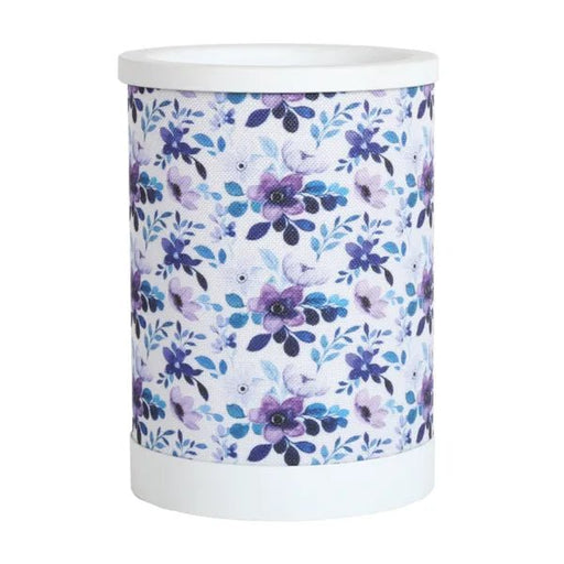 Lilac floral electric wax melt burner with a blue and purple floral pattern and white top and base.