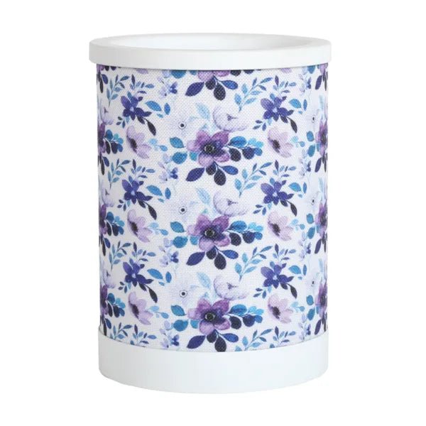 Lilac floral electric wax melt burner with a blue and purple floral pattern and white top and base.