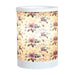 Lilac floral electric wax melt burner switched on, glowing warmly through the floral design.