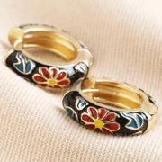 Pair of black enamel hoop earrings with red and blue cloisonné flowers