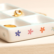 Close up of Lisa Angel blue bow and floral ceramic trinket tray with colourful flower details