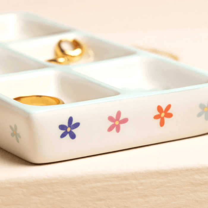 Close up of Lisa Angel blue bow and floral ceramic trinket tray with colourful flower details