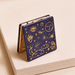 Lisa Angel Blue Starry Night Compact Mirror with navy and gold celestial design