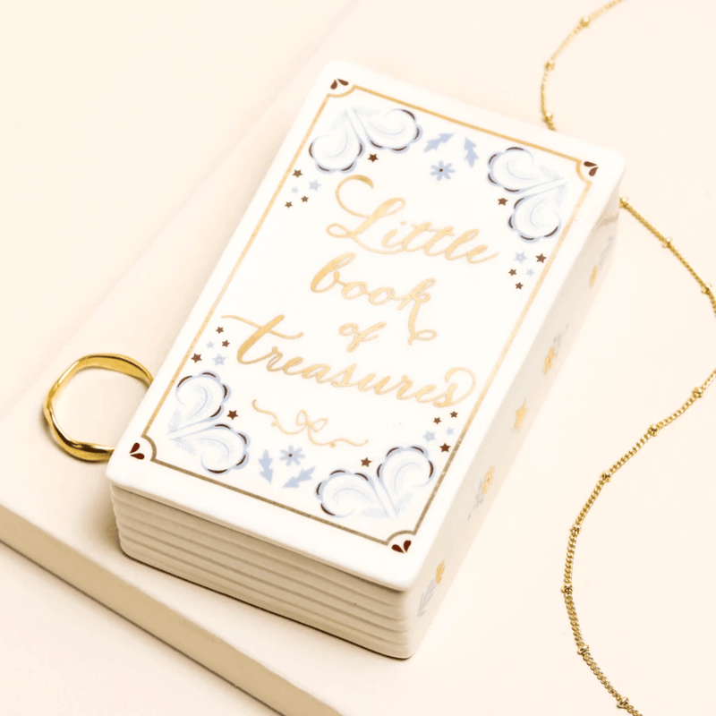 Lisa Angel ceramic book trinket pot displayed with gold jewellery