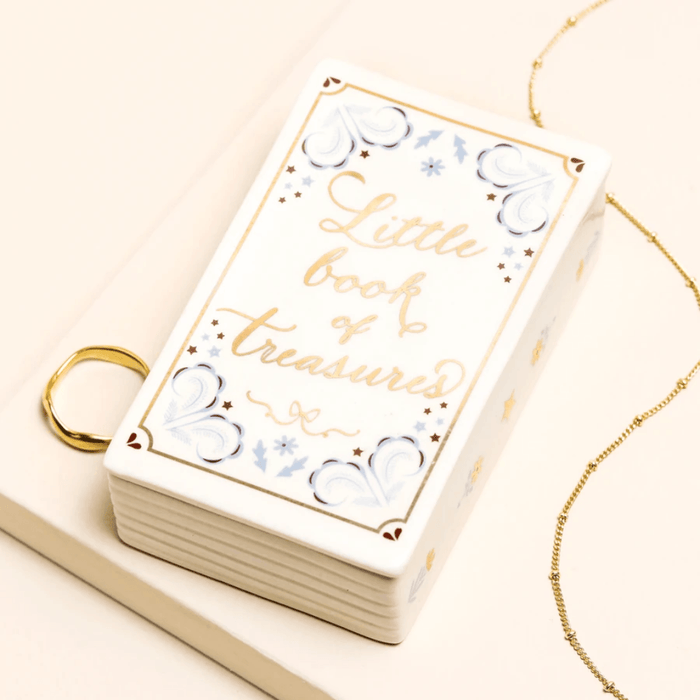 Lisa Angel ceramic book trinket pot displayed with gold jewellery