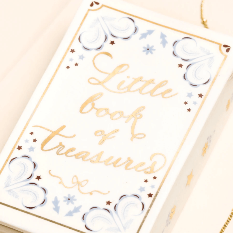 Close up of the Lisa Angel Little Book of Treasures ceramic trinket pot lid