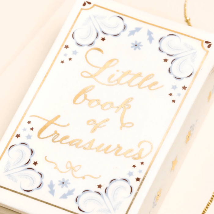 Close up of the Lisa Angel Little Book of Treasures ceramic trinket pot lid
