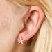 Lisa Angel Crystal Star Stud Earrings in Gold worn in ear