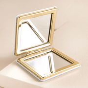 Open Lisa Angel Just Bee You Daisy Compact Mirror with gold frame and two mirrors