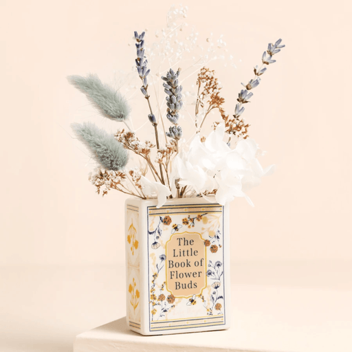 Lisa Angel Little Book of Flower Buds ceramic book vase filled with dried flower stems