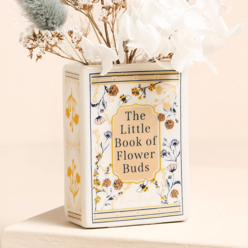Close-up of the floral and bee cover on the Lisa Angel ceramic book vase