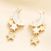Lisa Angel gold moon and star earrings with pearlescent crescents and cubic zirconia details