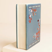 Side view of Lisa Angel Once Upon A Time Mini Ceramic Book Vase showing book spine