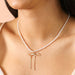 Lisa Angel Pearl Beaded Necklace with Gold Bow Charm - Something Different Gift Shop