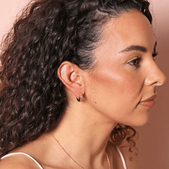 Lisa Angel Scattered Crystal Stars gold huggie hoop earrings worn by model