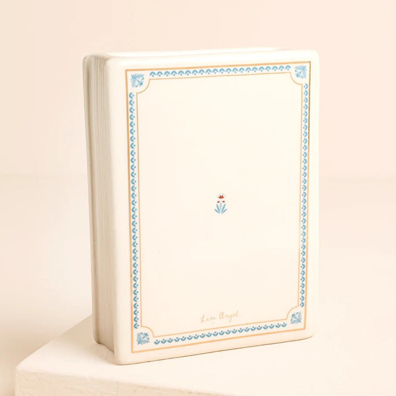 Back view of Tale as Old as Time mini ceramic book vase