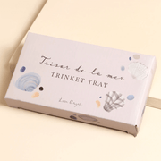 Gift box for Shells ceramic trinket tray with Trésor de la mer text and illustrated seashell details.