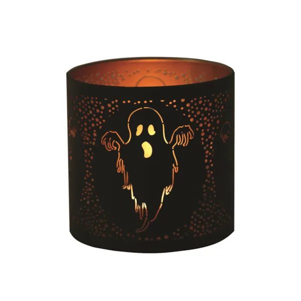 Halloween ghost wax burner glowing with tealight inside


