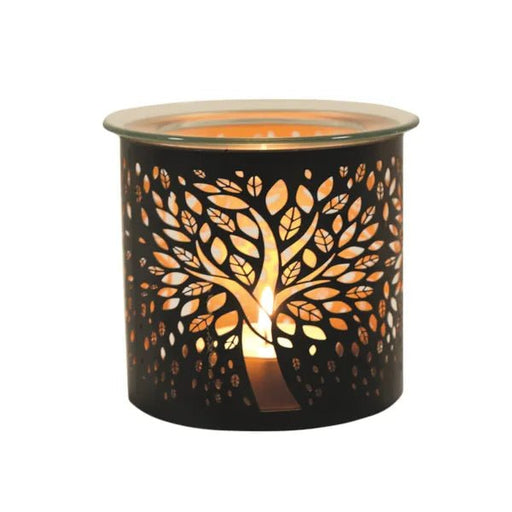 Tree of life wax melt burner glowing warmly with tealight

