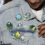 Loungefly A Bug’s Life mystery enamel pins displayed on a denim jacket
