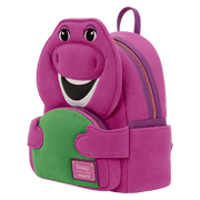 Angled view of the Loungefly Barney mini backpack showing the plush purple body, side profile, gold zip and green front pocket.