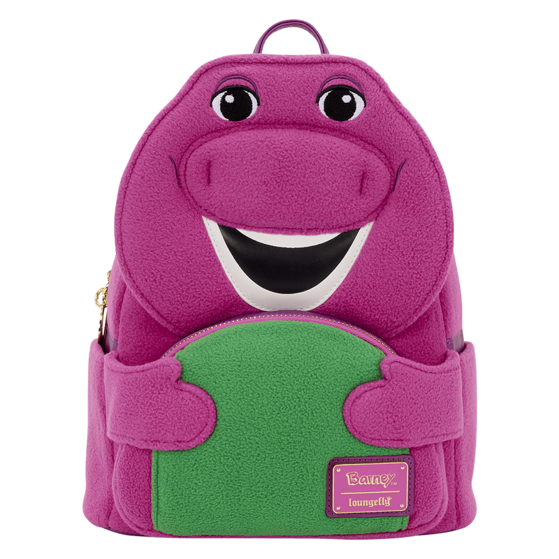 Front view of the Loungefly Barney mini backpack with plush Barney face, green tummy pocket and Loungefly front badge.