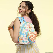 Model wearing Loungefly Beatles mini backpack with heart All You Need Is Love pocket – Loungefly backpack
