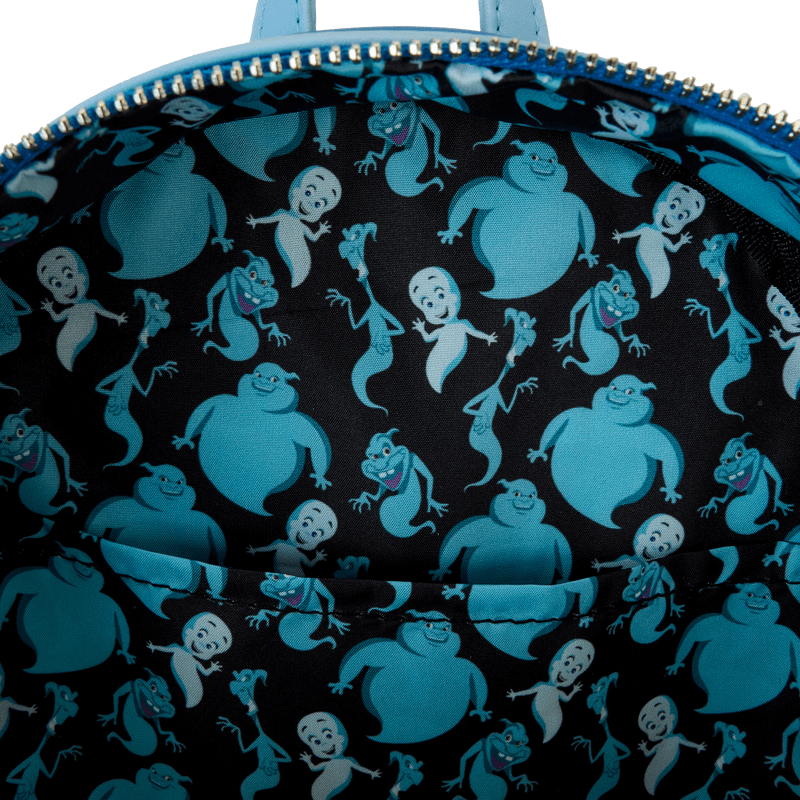 Interior lining of Loungefly Casper mini backpack with repeating Casper and uncles pattern – Loungefly bag detail
