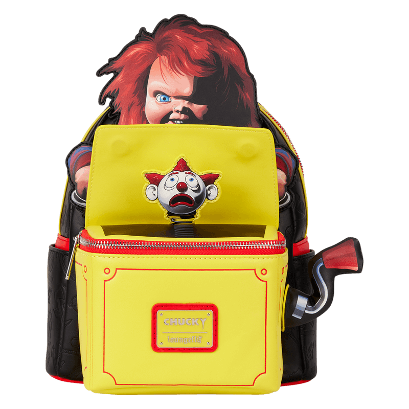 Open view of Loungefly Chucky backpack showing spring-loaded clown under lift-up yellow lid

