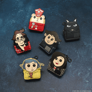 Six Loungefly Coraline mini backpack keychain charm designs arranged on a blue background
