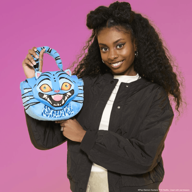 Person holding the Loungefly Netflix KPop Demon Hunters Derpy crossbody bag