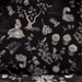 Interior lining of Loungefly Disney Alice in Wonderland Floral Mini Backpack with black Alice print
