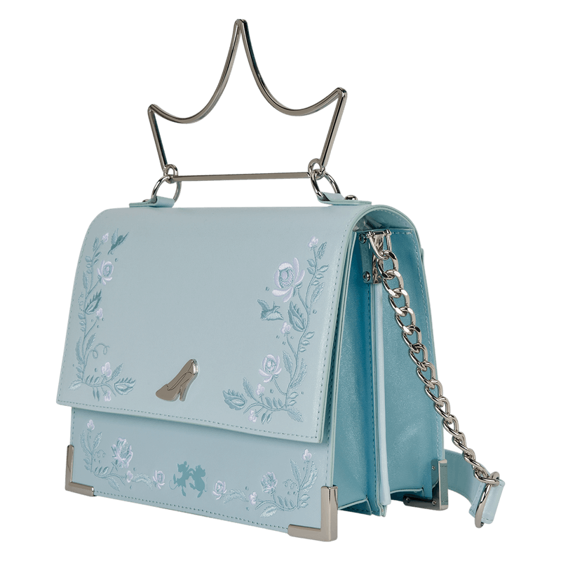 Angled view of Loungefly Disney Cinderella crossbody bag with crown handle and floral trim