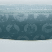 Interior lining of Loungefly Cinderella crossbody bag with character silhouettes and castle
