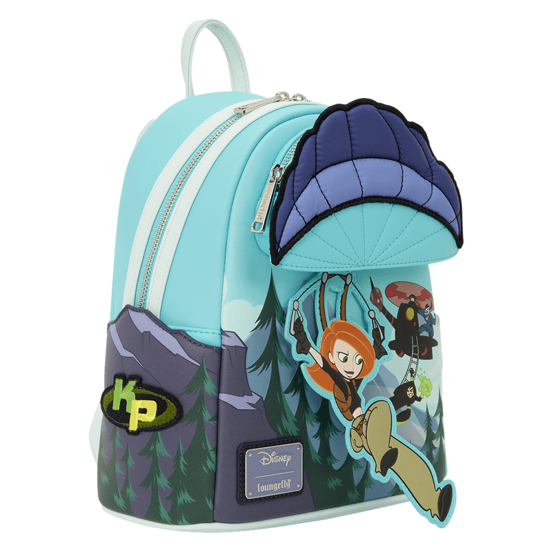 Side view of the Loungefly Disney Kim Possible Paragliding Mini Backpack with embroidered KP logo patch and mountain scene artwork