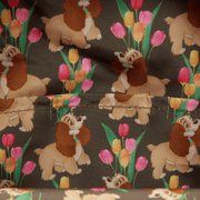 Close-up of the lining inside the Loungefly Disney Lady and the Tramp Pastel Tulip Mini Backpack with an all-over Lady and tulip print