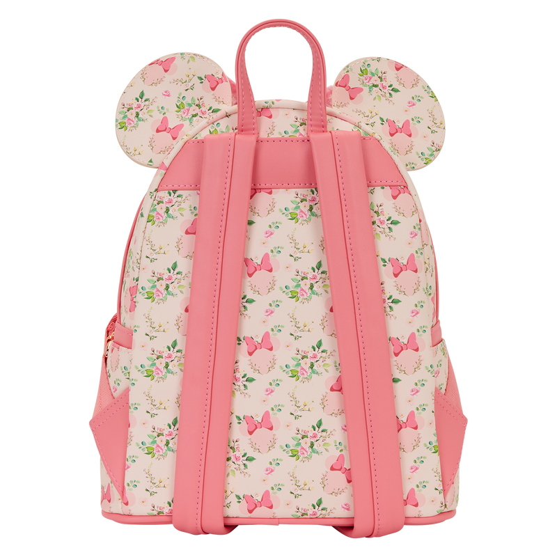 Back view of the Loungefly Disney Minnie Mouse floral mini backpack, showing pink straps, top handle and all-over floral bow print.