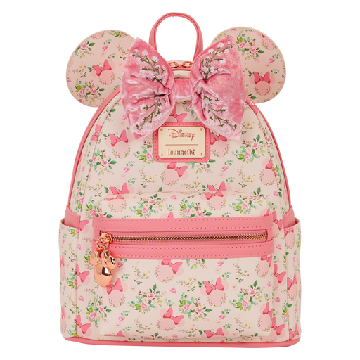 Front view of the Loungefly Disney Minnie Mouse floral mini backpack with Minnie ears, large pink velvet bow and front zip pocket.