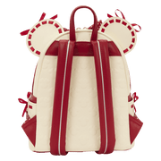 Back view of the Loungefly Disney Minnie Mouse Rocks The Dots mini backpack showing red straps, top handle and embossed Mickey icon pattern.