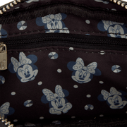 Minnie Mouse patterned interior lining inside the Loungefly Studs & Chains Crossbody Bag